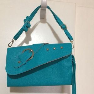 Blue cross body /clutch bag.